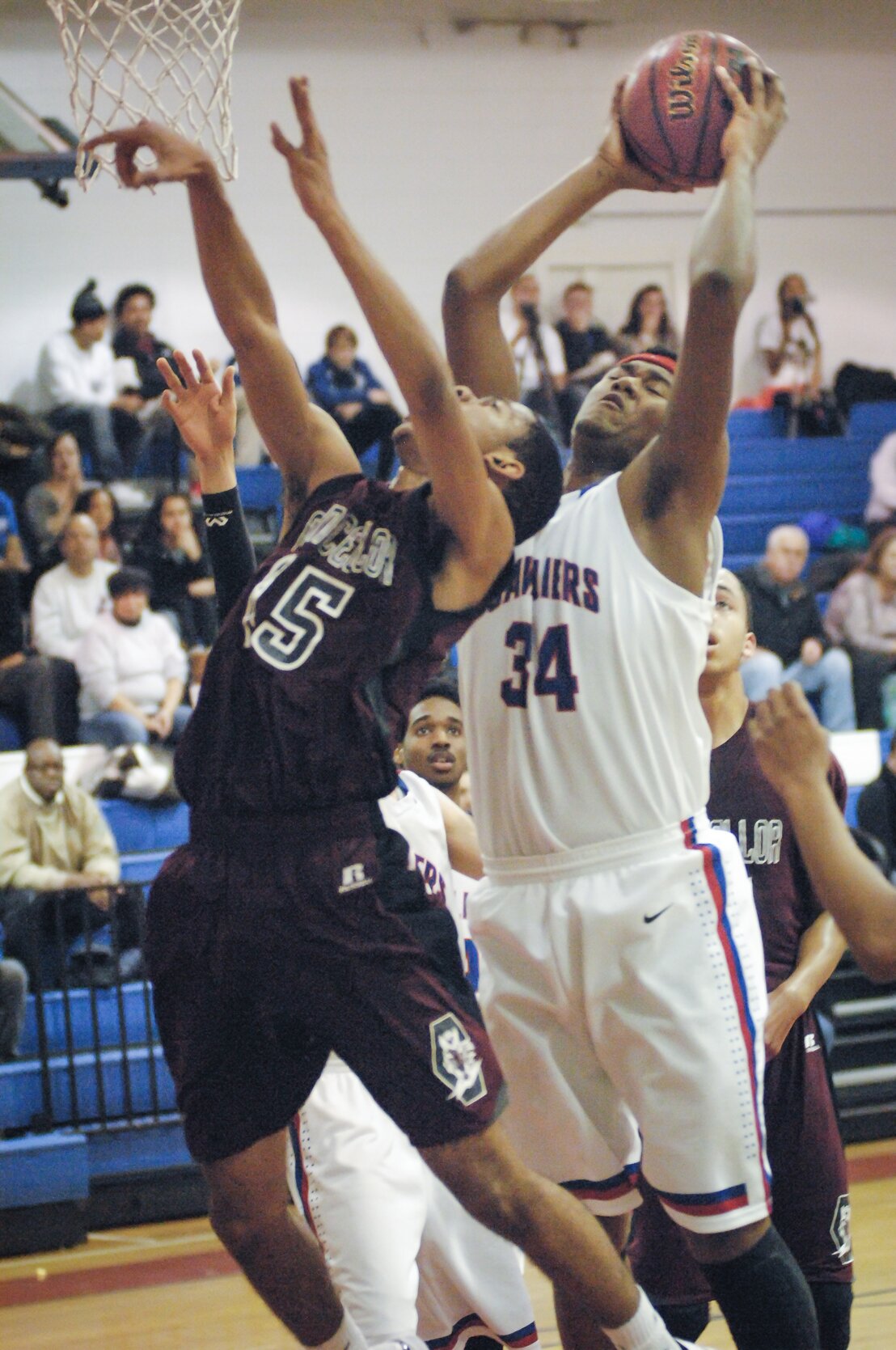 A.J. Derricott goes for the basket in last week's game against Chancellor. Photo by Dawn Haun.