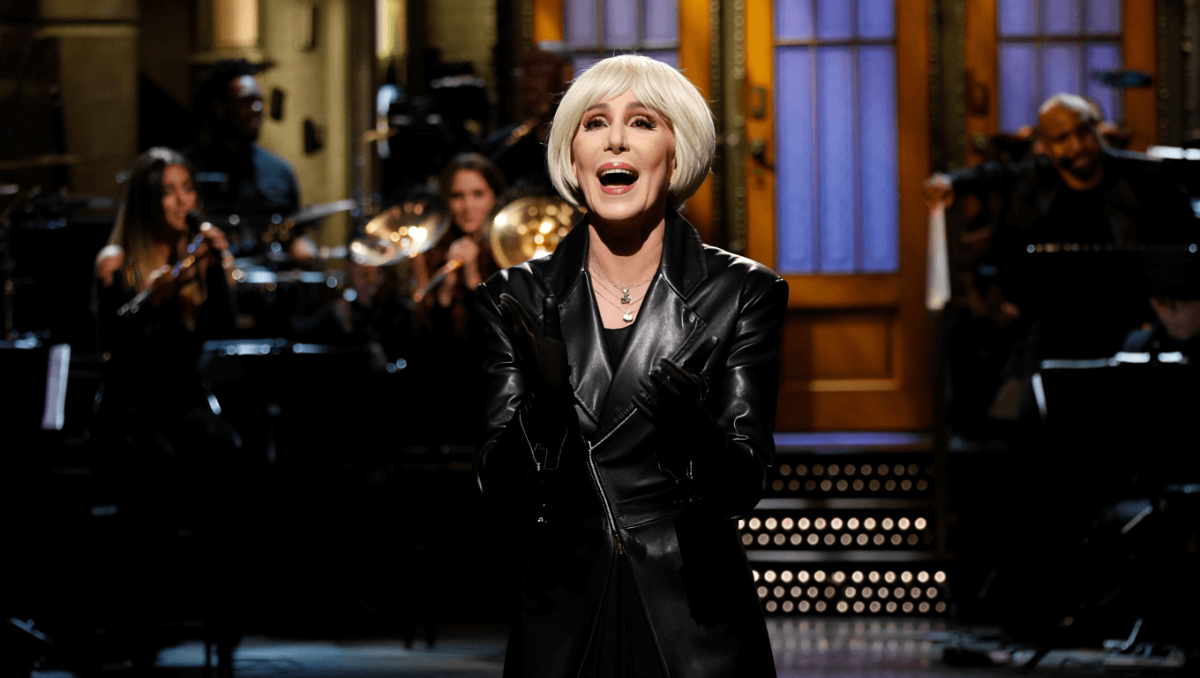 Cher goes rock ‘n’ roll in leather jacket and blond wig for holiday performance on ‘Saturday Night Live’