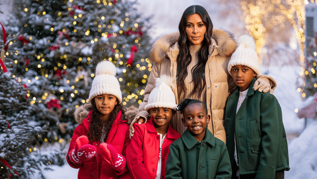 Kim Kardashian finally gets all 4 kids in sweet Christmas snaps after failed attempts