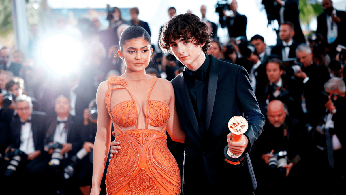 
		Kylie Jenner shimmers in orange gown at Palm Springs Film Festival after kicking off new year in gold bikini	