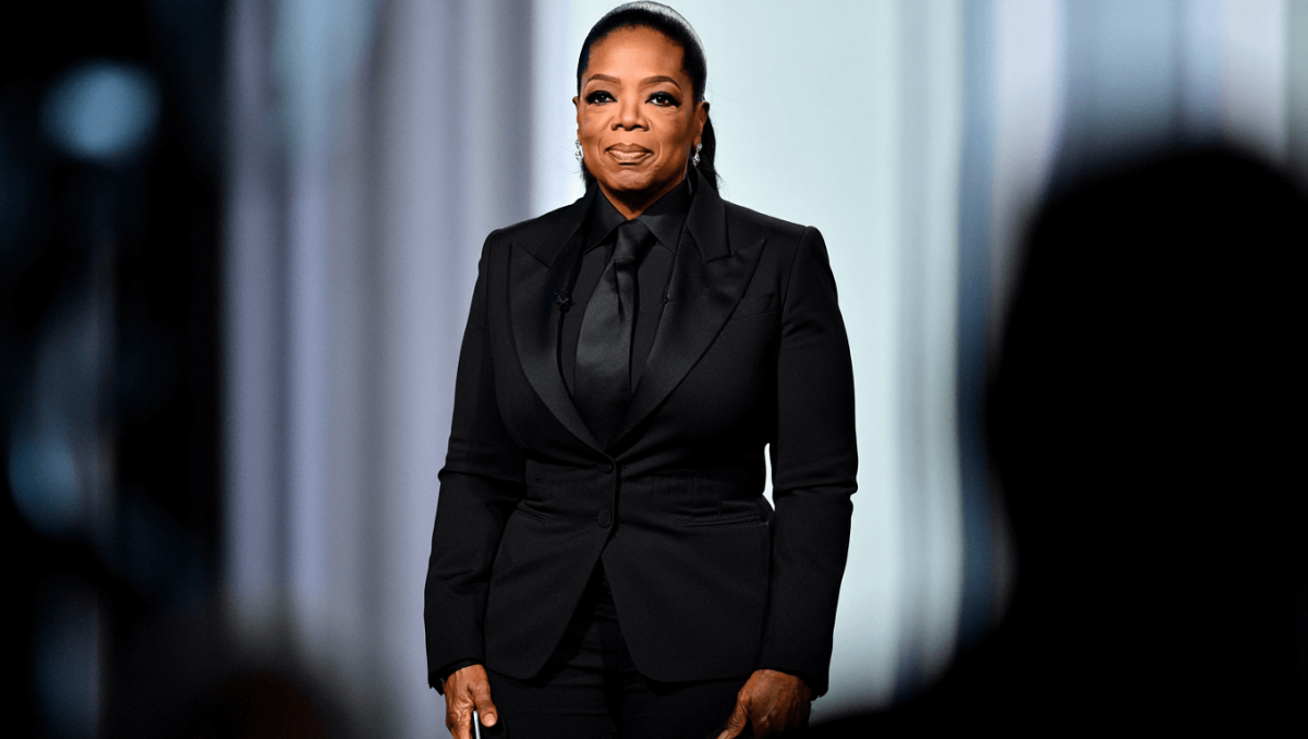 Oprah takes Hailey Bieber’s power suit and tie for a spin