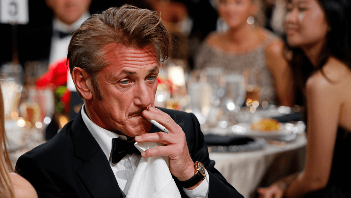 Sean Penn caught smoking at his table during the Golden Globes 2026