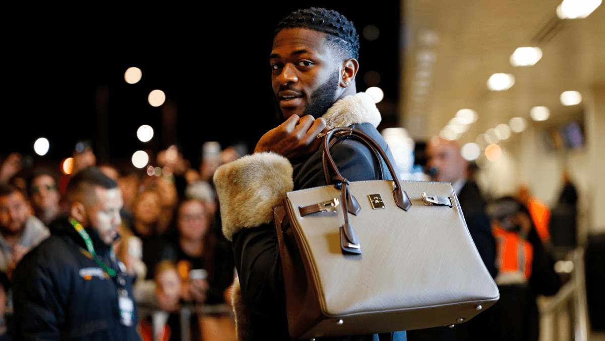 Stefon Diggs spotted with rare Birkin bag and fur boots ahead of Super Bowl 2026: ‘He’s wearing Cardi’s clothes’