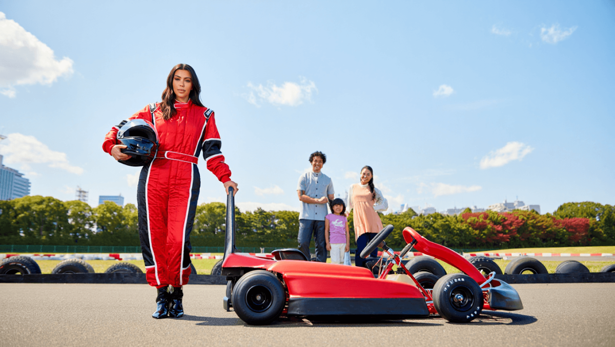 
		Kim Kardashian channels boyfriend Lewis Hamilton in racing gear during family getaway to Tokyo	