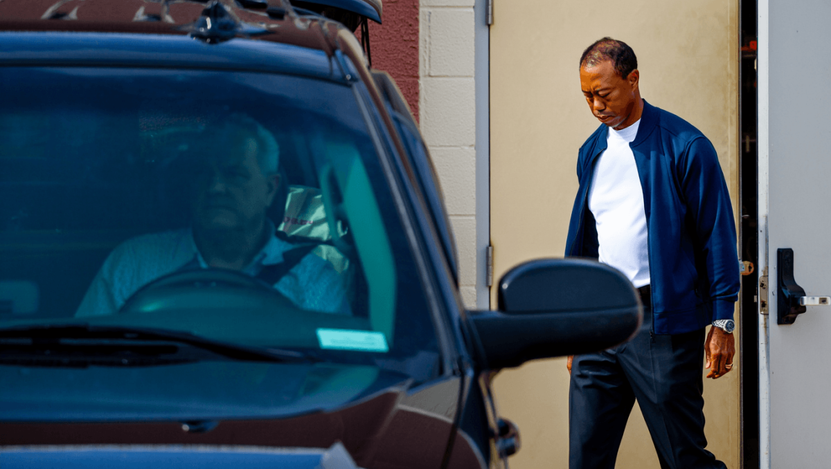 
		Tiger Woods seen leaving jail in first photos since Florida car crash, DUI arrest	