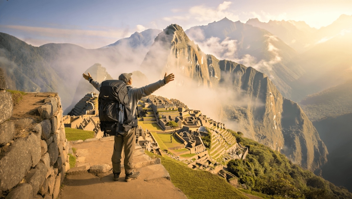 Traveler walking the Inca Trail in Peru on a sunny day