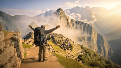 Traveler walking the Inca Trail in Peru on a sunny day