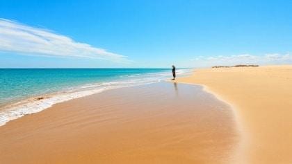 Vale de Centeanes beach, a sandy beach surrounded by cliffs near the seaside town of Carvoeiro in the southern region of the Algarve, Portugal