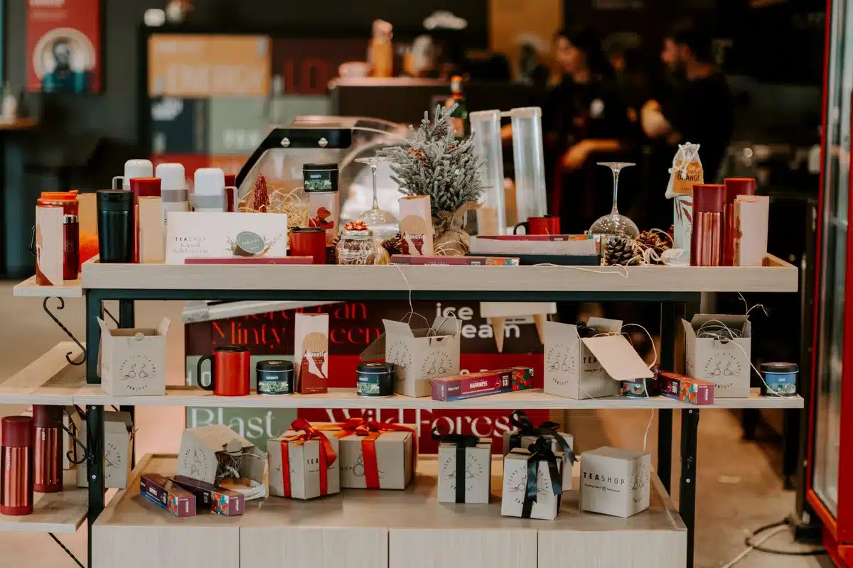 Modern pop-up café interior with bright décor and healthy menu boards in a seasonal venue.