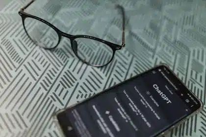 Smartphone screen showing a chat conversation with product carousel tiles displayed at the bottom