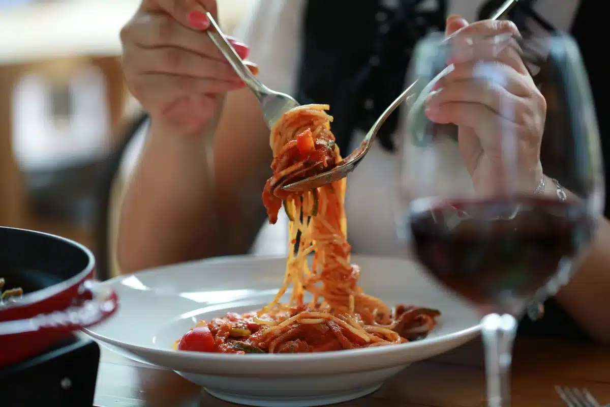 Cozy traditional Italian osteria with regional dishes, wine, and warm atmosphere