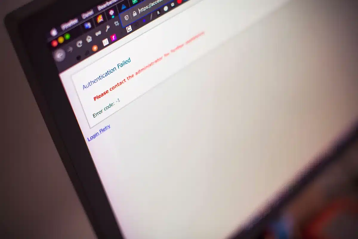 Laptop screen showing account login and verification process for card benefits activation