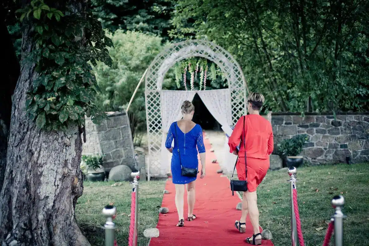 Celebrities posing on a red carpet at a major entertainment event.