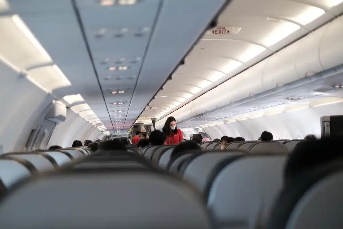 Passengers boarding a commercial aircraft, representing continued flight operations under the partnership.