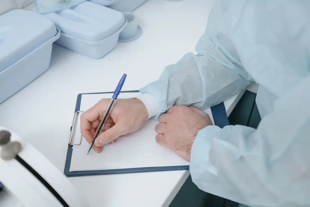 Hospital admission paperwork and medical records on a desk