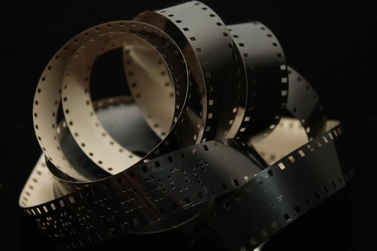 Vintage film scene featuring an ensemble cast of actors in dramatic moment