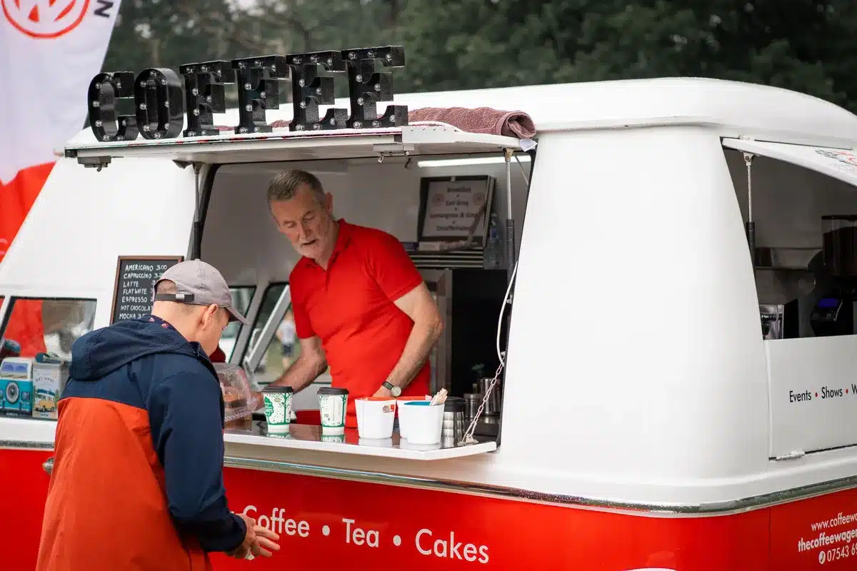 Customers sampling products at an outdoor pop-up activation event