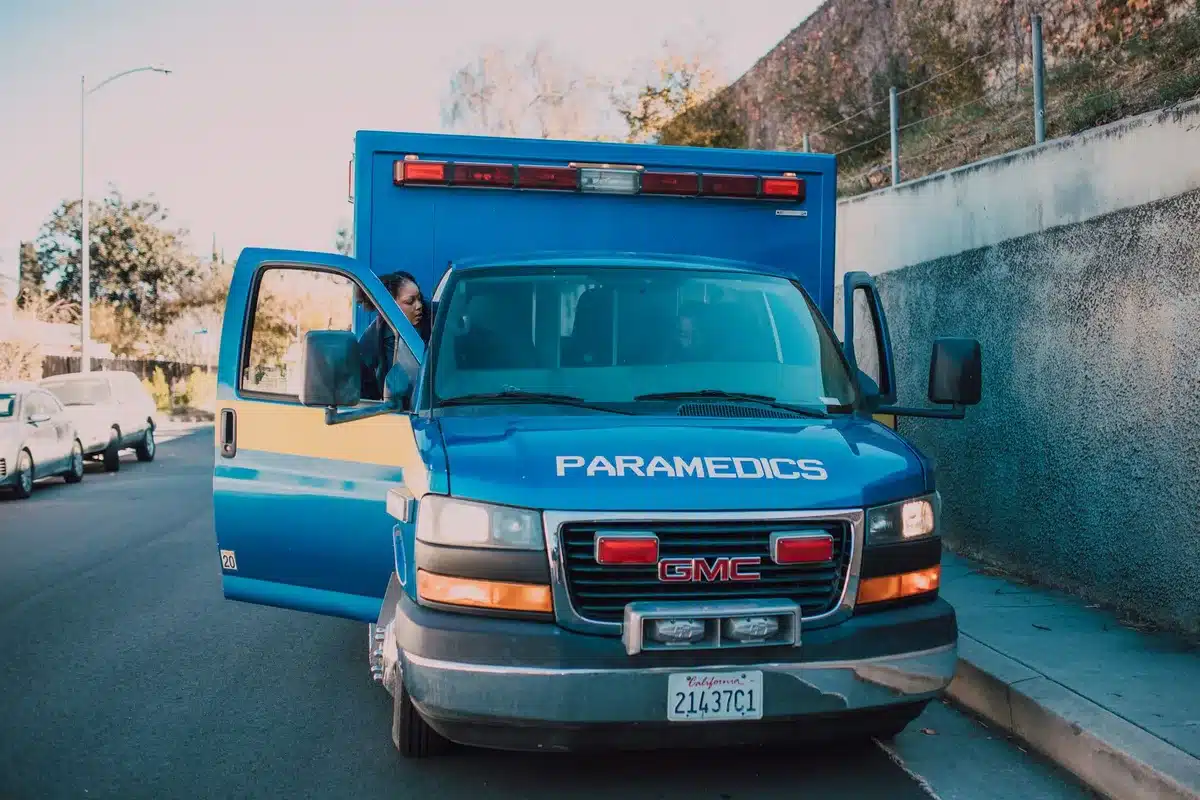 Paramedics and emergency personnel responding to a medical crisis