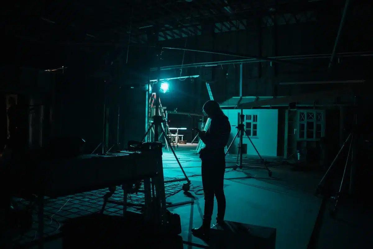 Behind-the-scenes moment on a television drama set with actors interacting