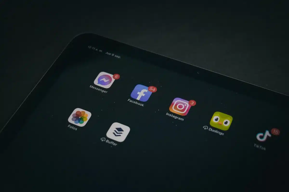 Close-up of social media feed with algorithm-driven content and engagement metrics visible