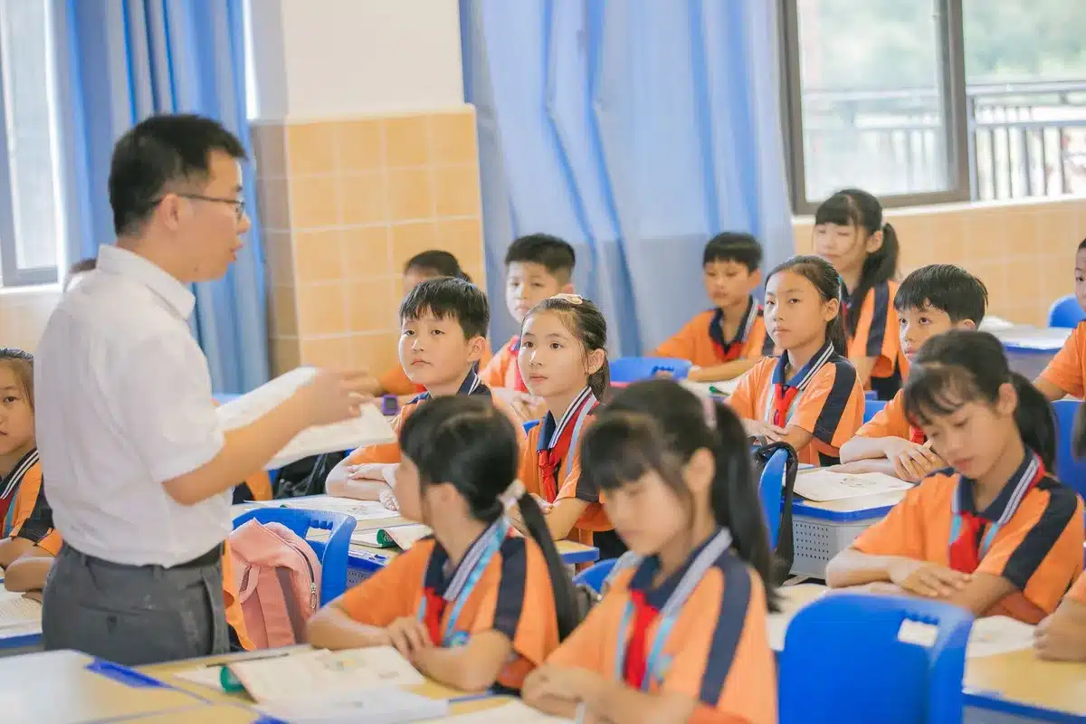 Children in a classroom setting, focusing on education and school environment