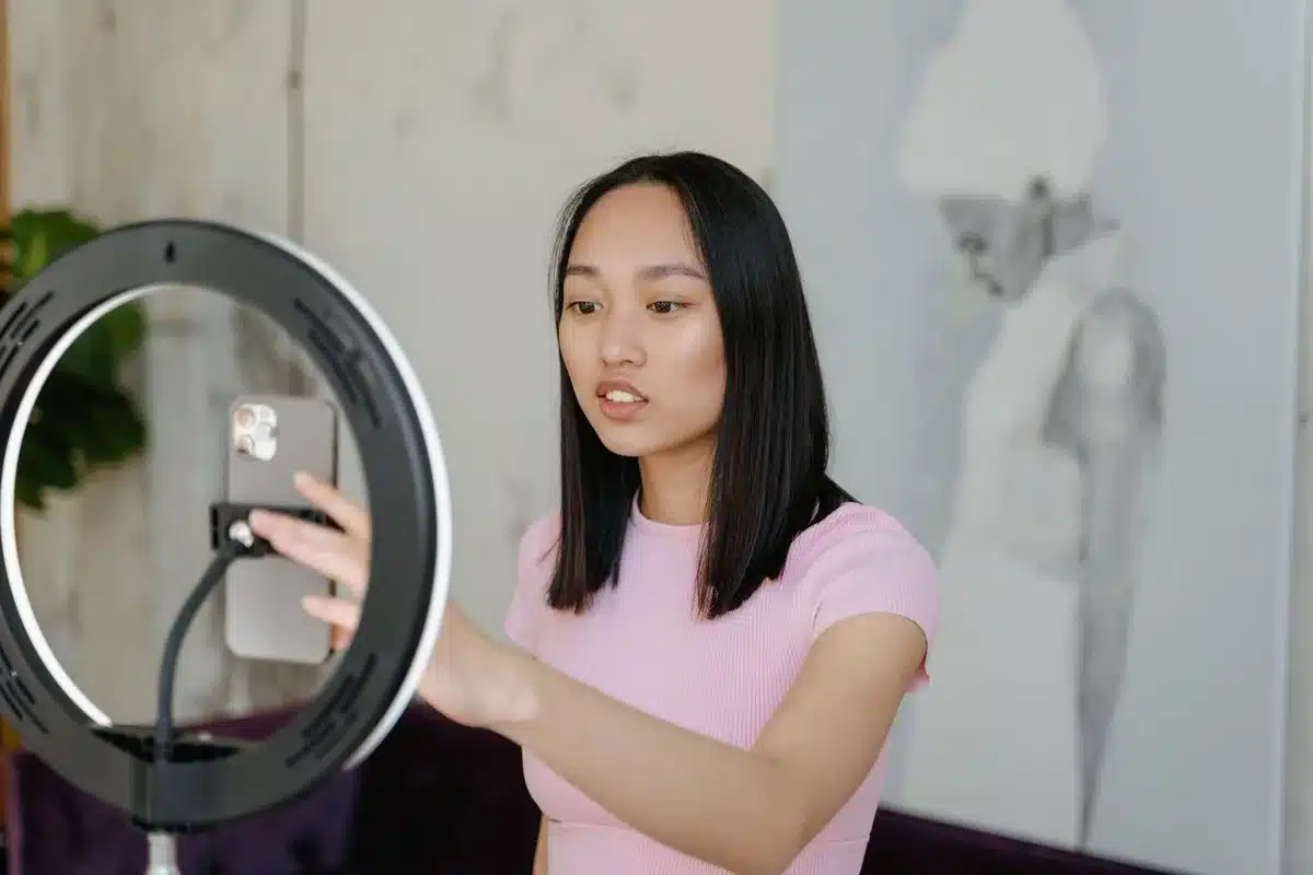 Content creator filming short-form video on smartphone for social media