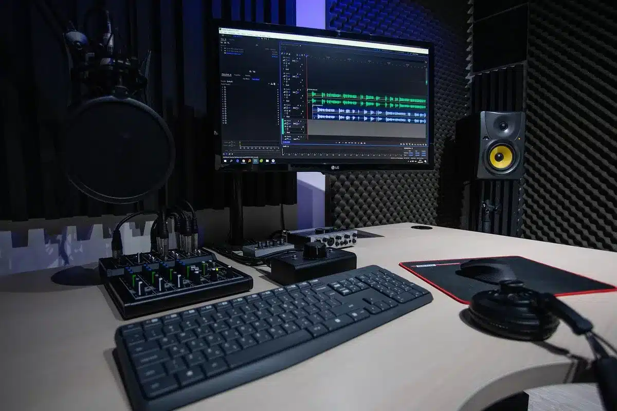 Podcast studio setup with microphone and headphones during a live interview recording