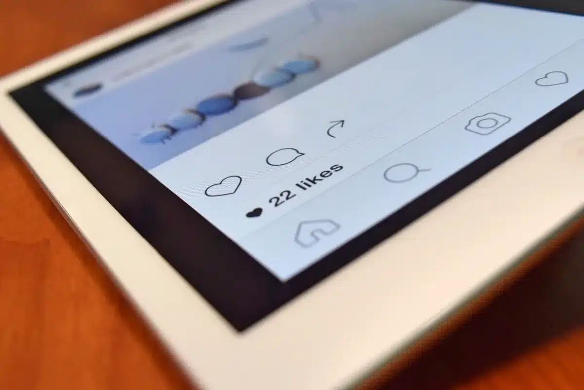 Smartphone screen showing comments and reactions on social media