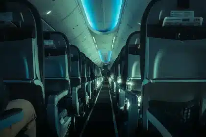 Modern aircraft cabin interior with premium seating, soft lighting, and contemporary design elements