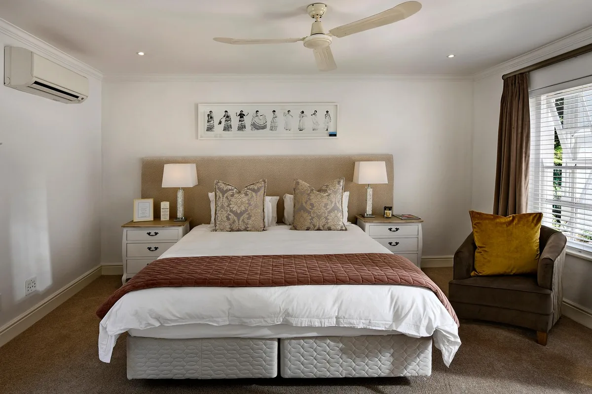 Stylish boutique hotel room with curated art and contemporary furnishings
