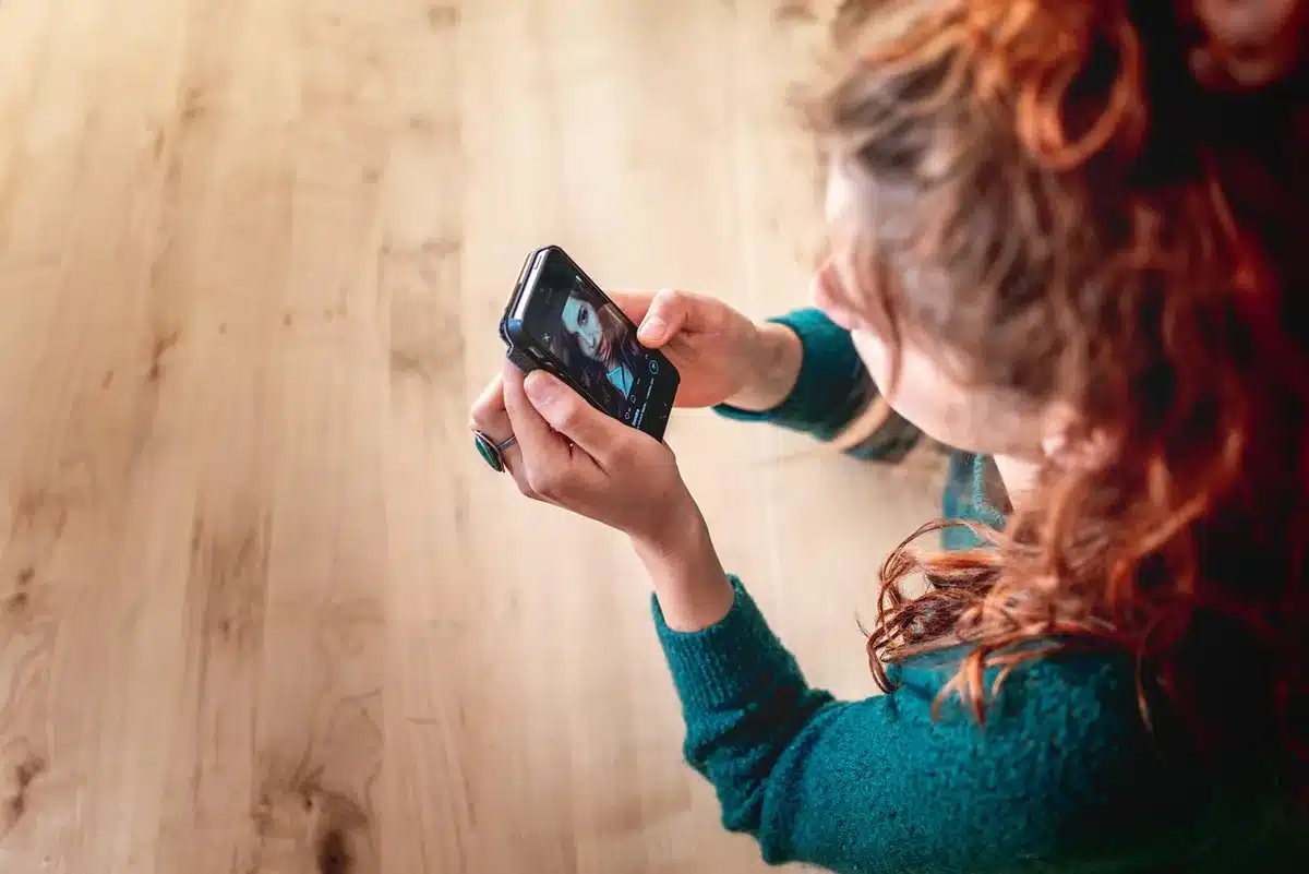 Phone screen showing social media comments and reactions