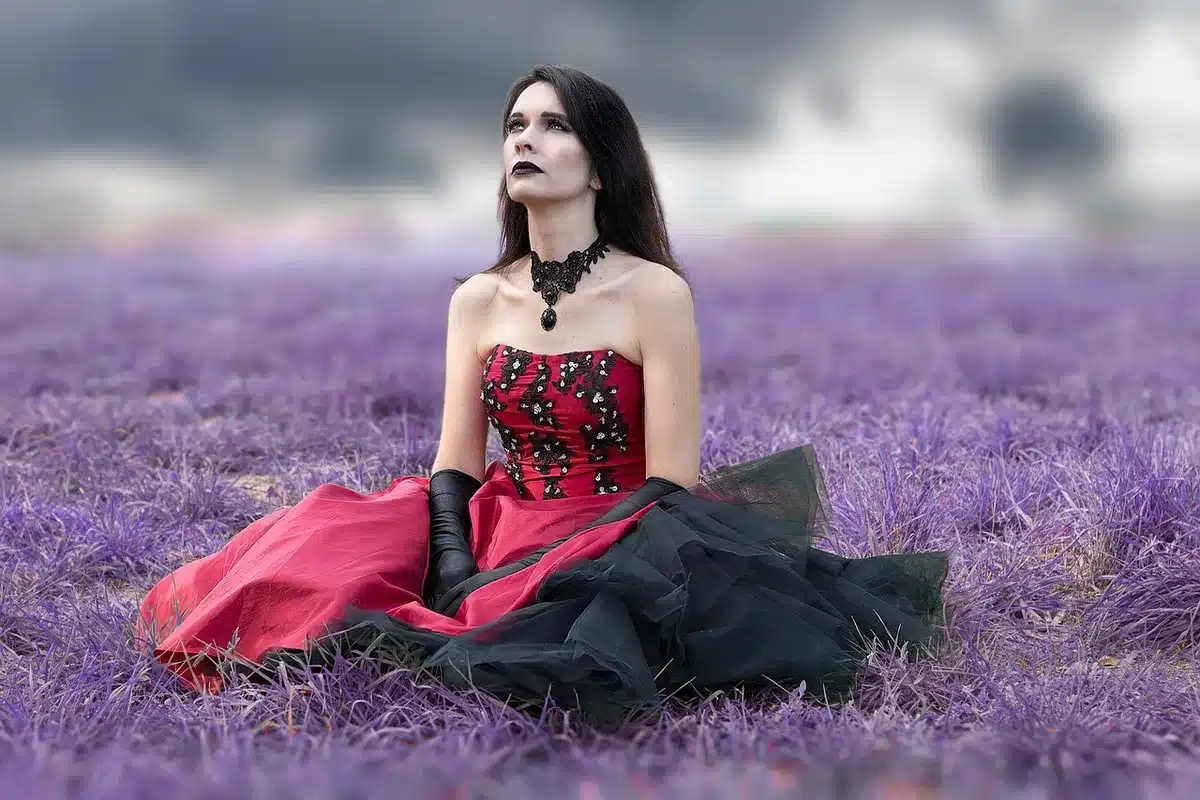 Surreal music video scene with dramatic costume and theatrical staging