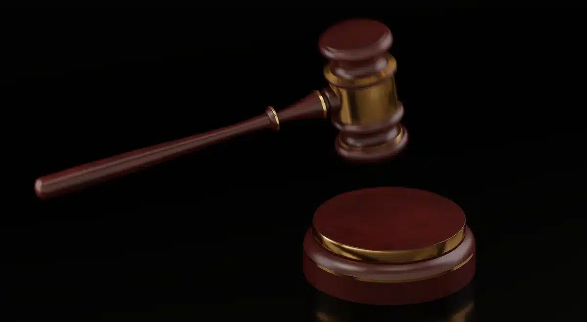 File folder labeled legal documents and a gavel on a desk