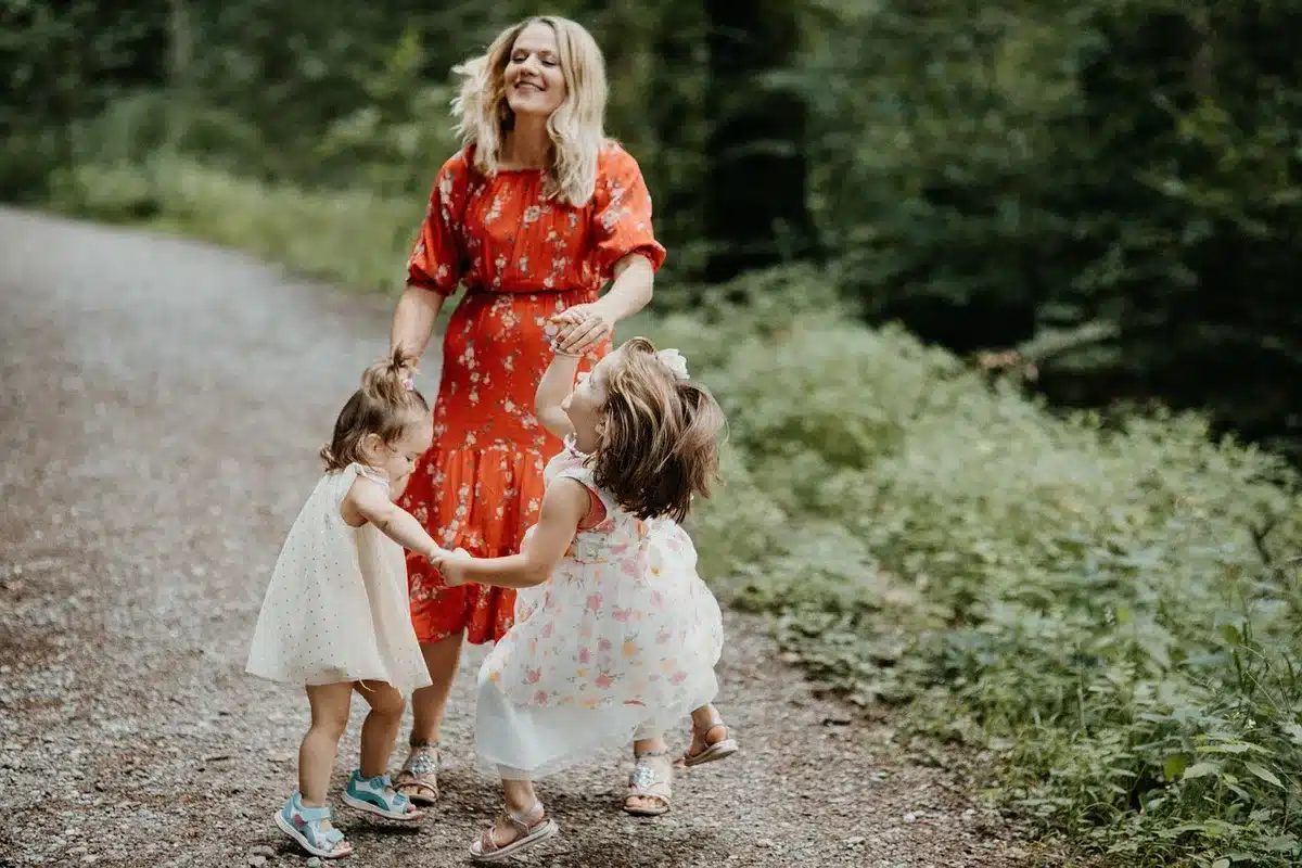 Parents managing morning routine with children at home