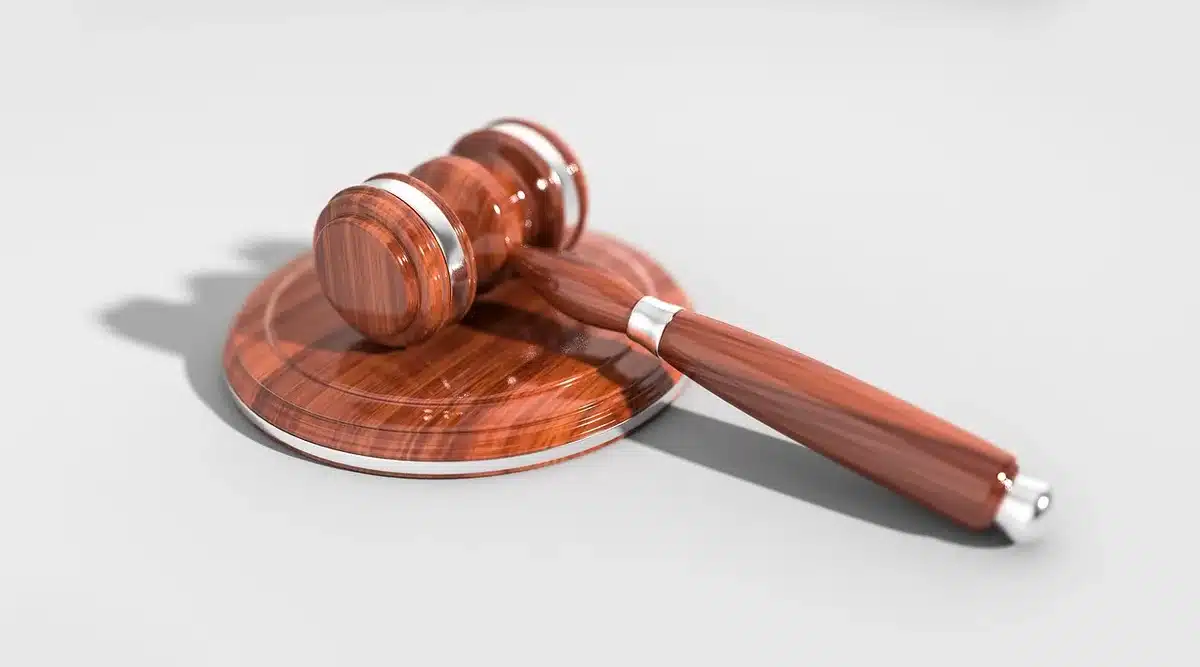 Court filing documents and legal paperwork on a judge's desk.
