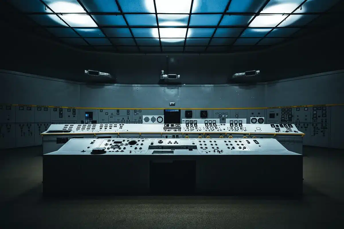 Television studio production control room with monitors and editing equipment