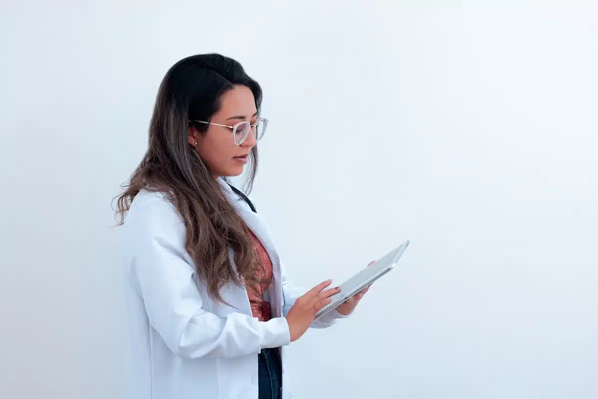 Doctor reviewing a patient's chart during a follow-up appointment