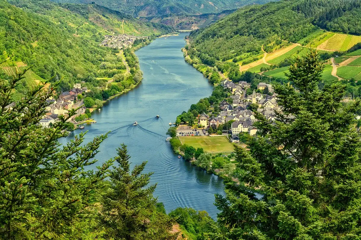 Panoramic view of the River Thames from a hilltop with green foreground