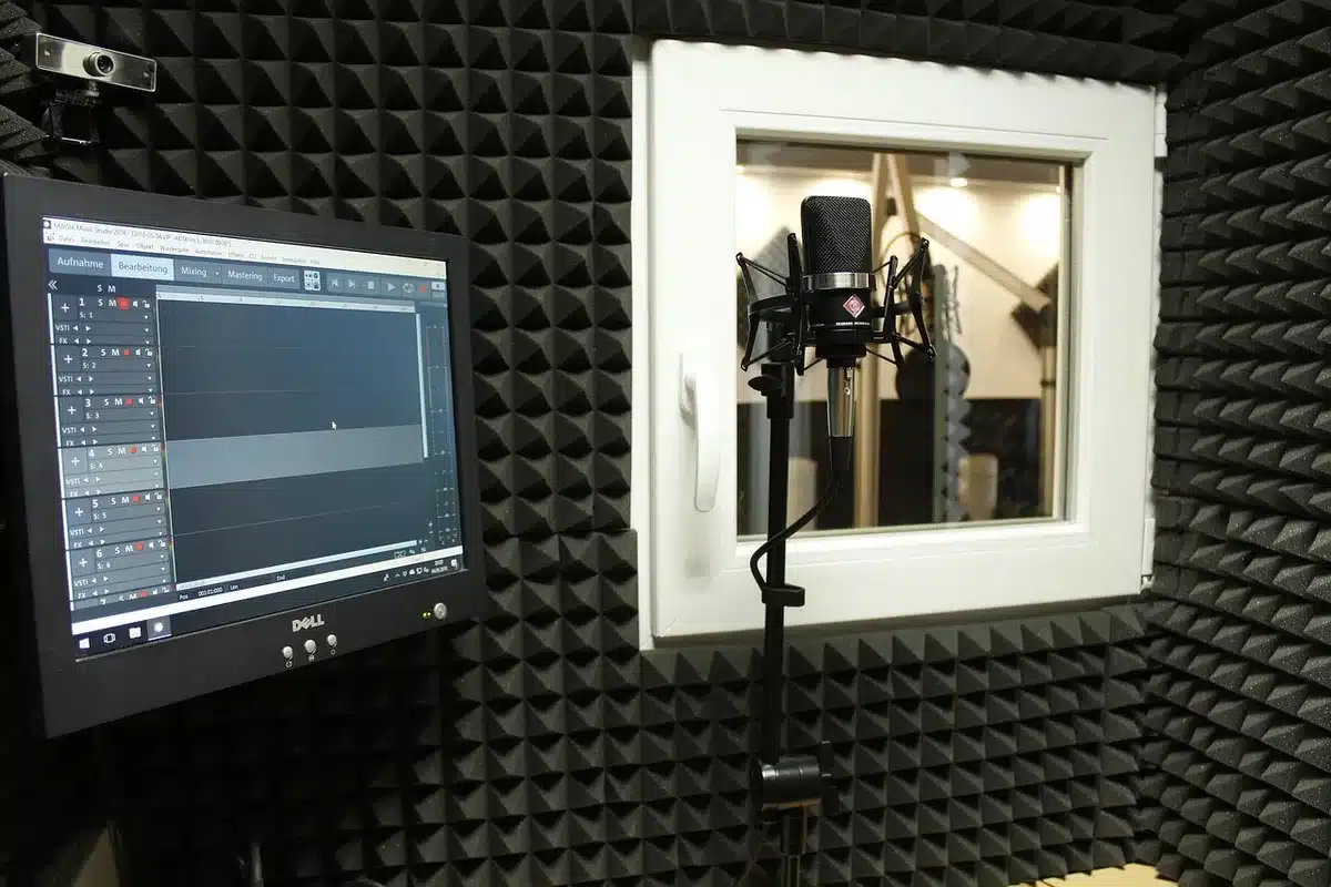 Singer recording a holiday song in a studio with a microphone