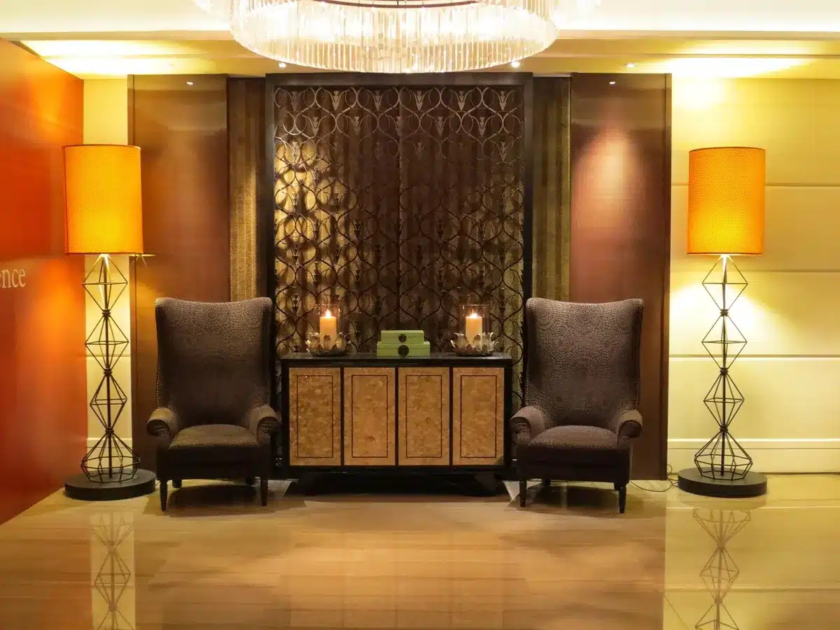 Elegantly decorated hotel lobby with polished furnishings and soft lighting
