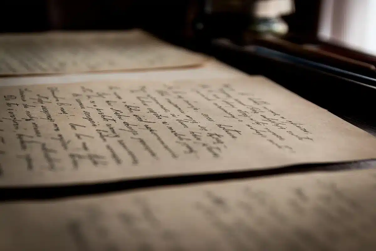 Close-up of old handwritten logbook pages and entries
