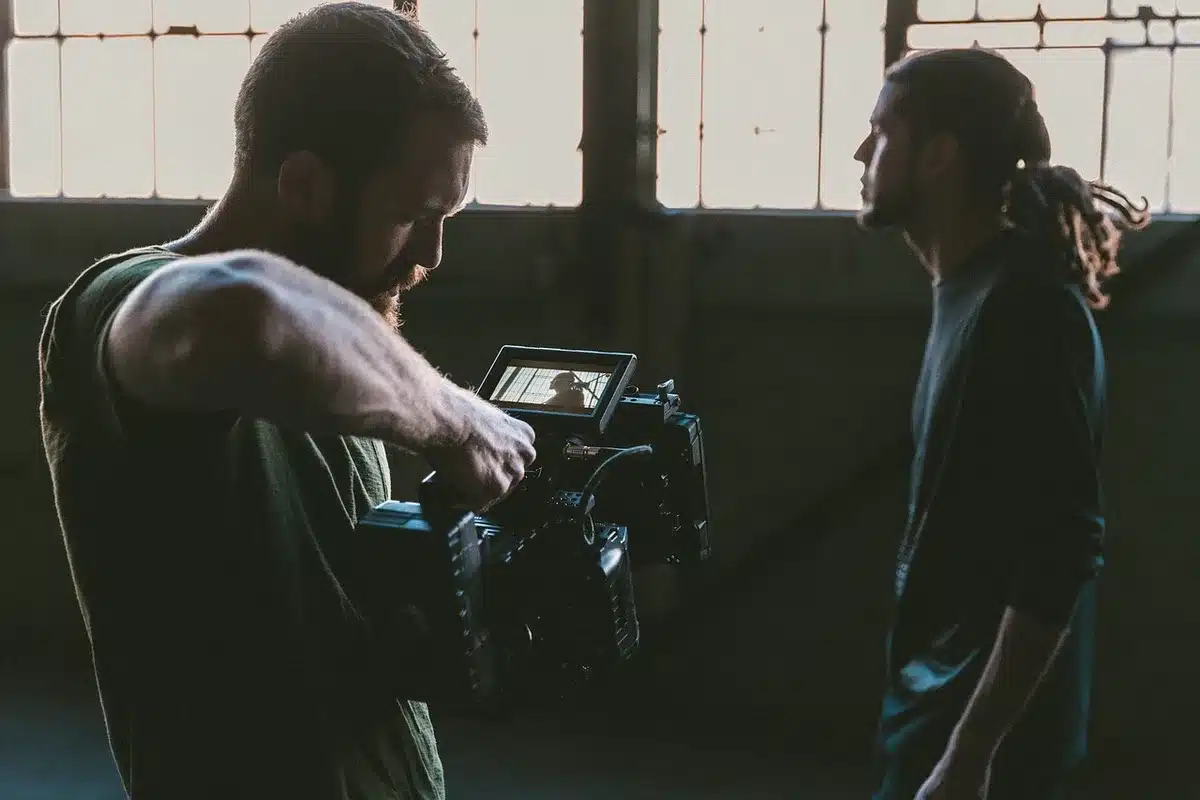 Director-actor discussing a scene on set