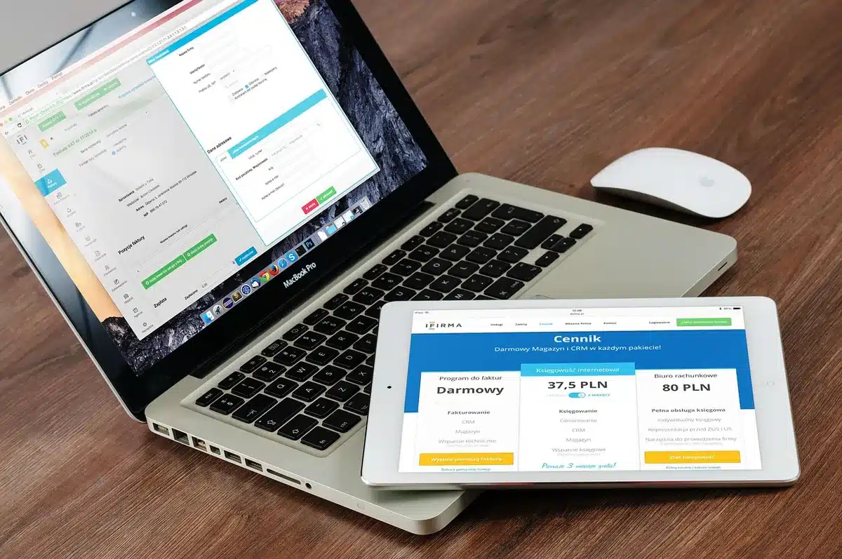 Person browsing ticket marketplace on a laptop showing event listings