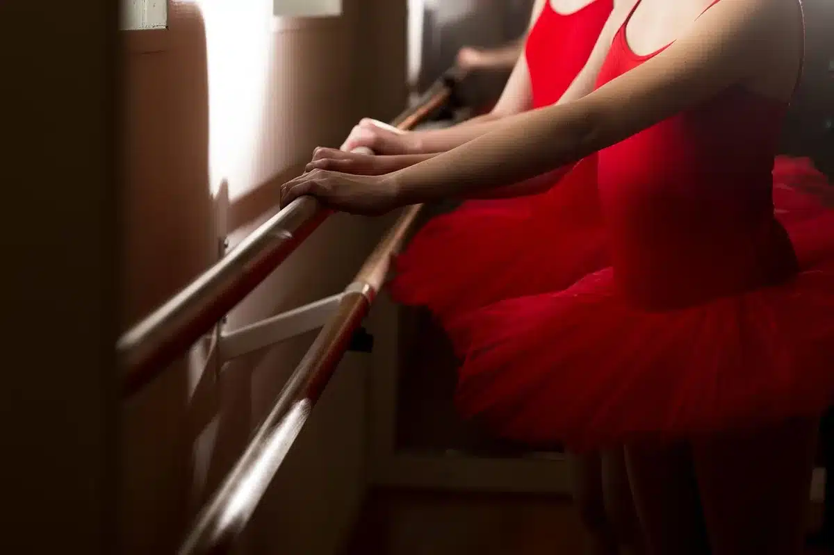 Behind-the-scenes rehearsal photos capturing candid moments between dance partners.