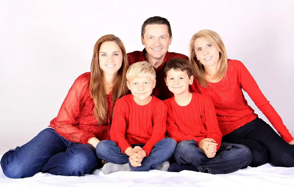 Parent managing children’s morning routine at home