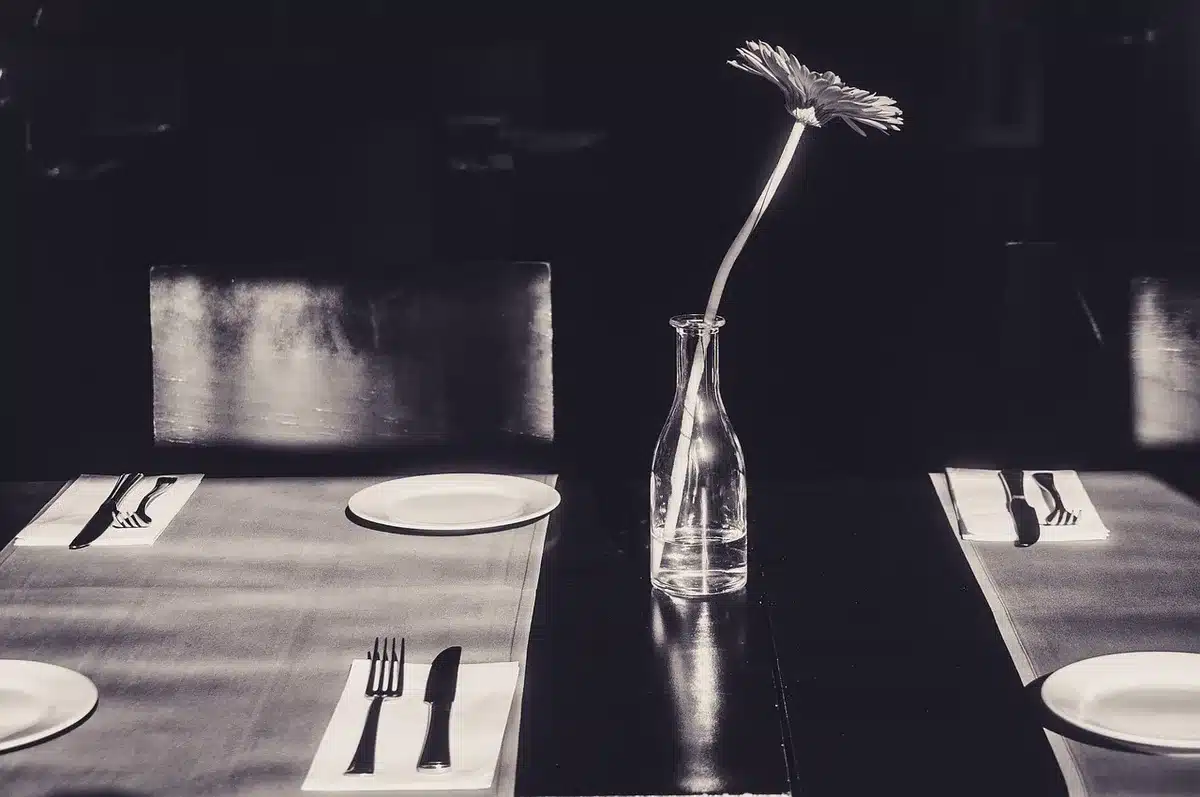 Table at an upscale restaurant with check and drinks
