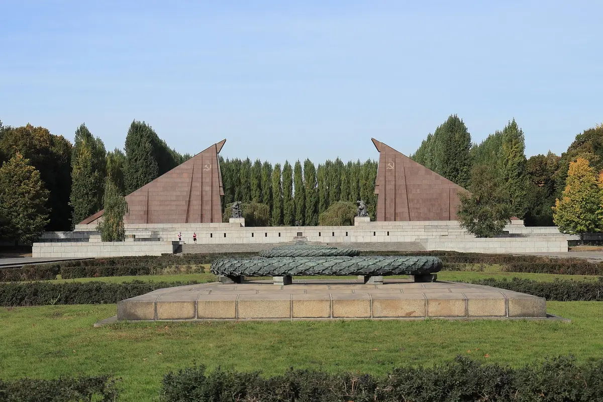 Broad Soviet-era boulevard with parkland and concrete civic buildings in Chișinău