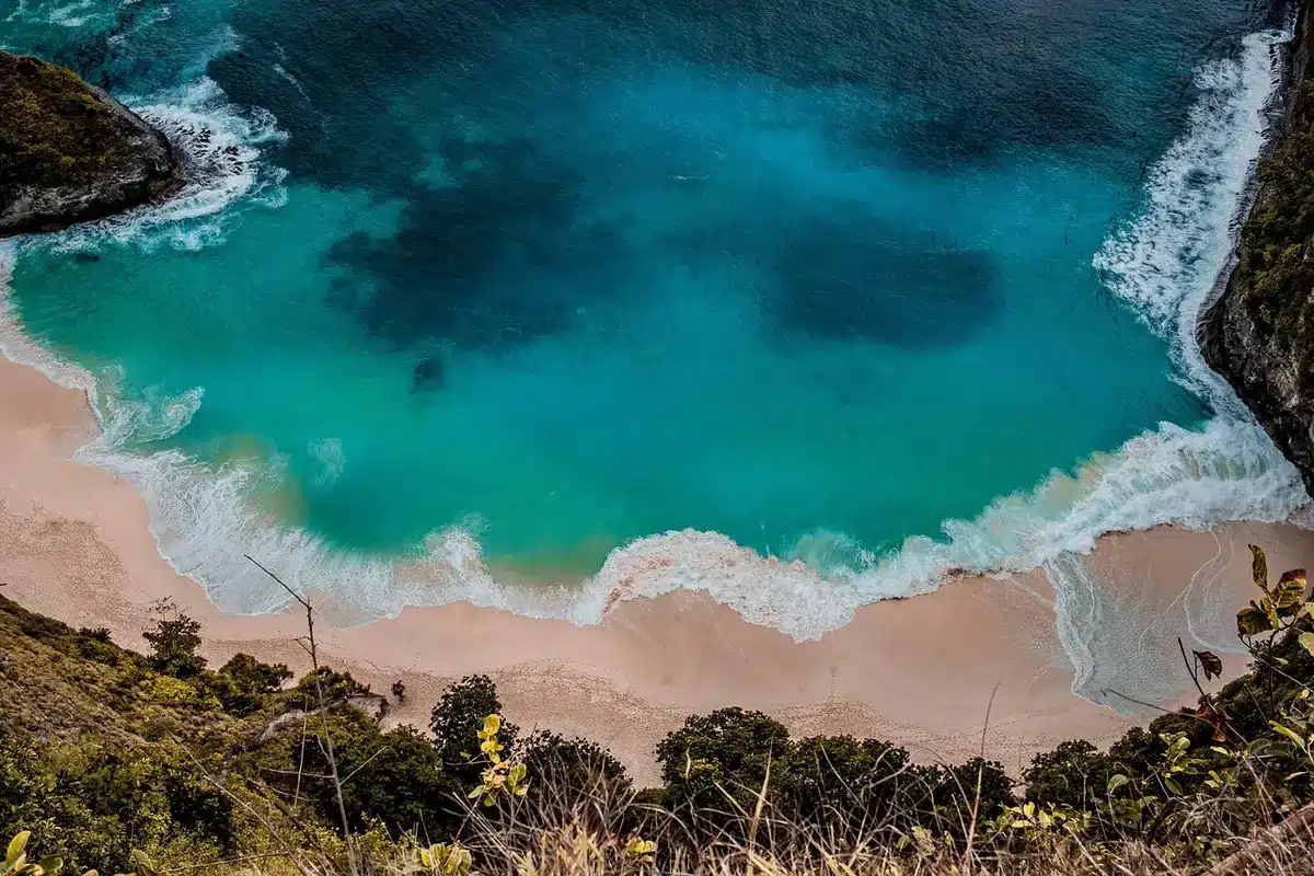 Aerial view of Grace Bay's white sand and clear reef off Providenciales