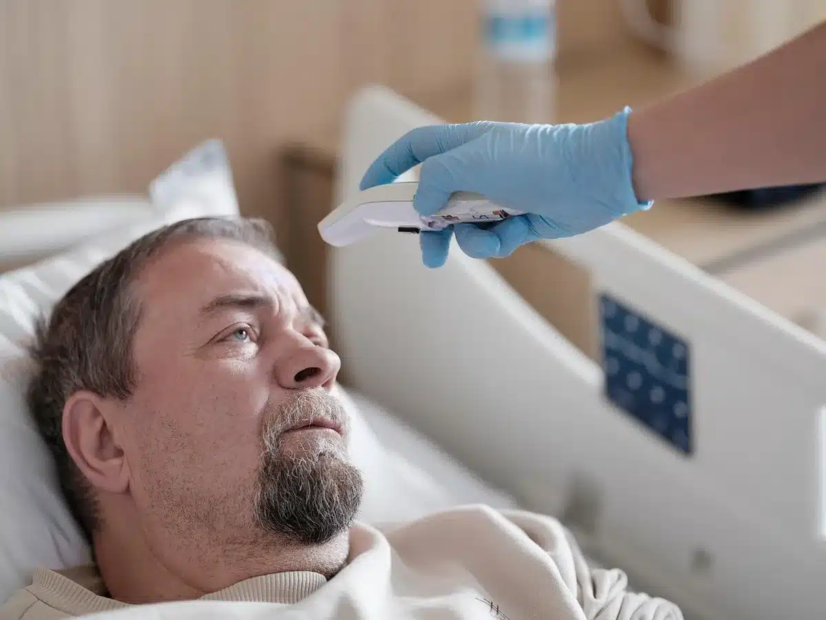 Close-up of an actor's ankle in a medical boot during recovery