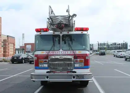 Silhouette of firefighter costume and ladder truck on a studio lot
